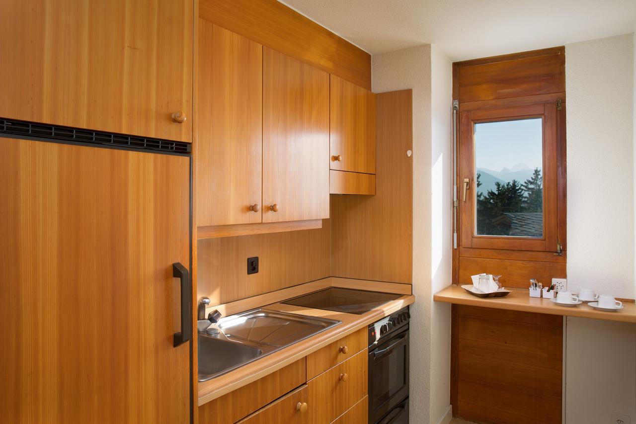 Aparthotel Helvetia Кранс Монтана Екстериор снимка